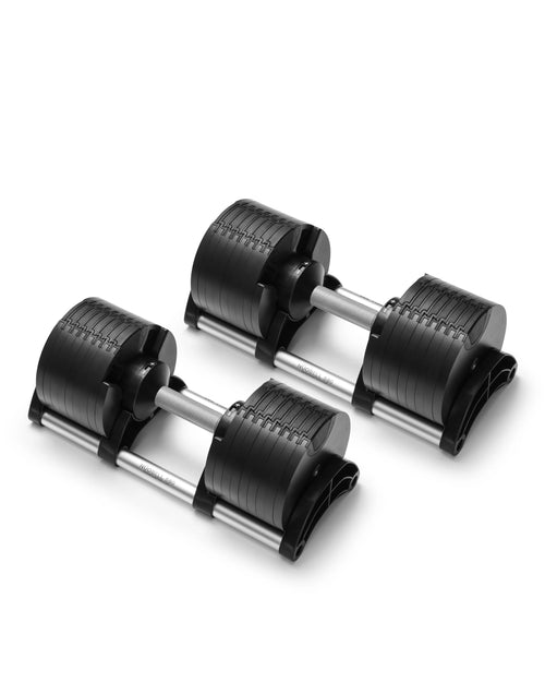 NÜOBELL 580 silver adjustable dumbbells featuring sleek design and easy weight adjustment, perfect for space-saving home workouts and versatile strength training.