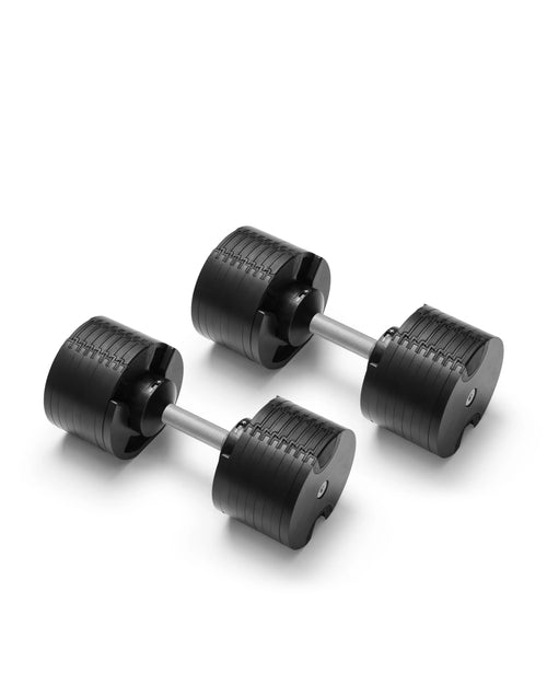 NÜOBELL 580 silver adjustable dumbbells featuring sleek design and easy weight adjustment, perfect for space-saving home workouts and versatile strength training.