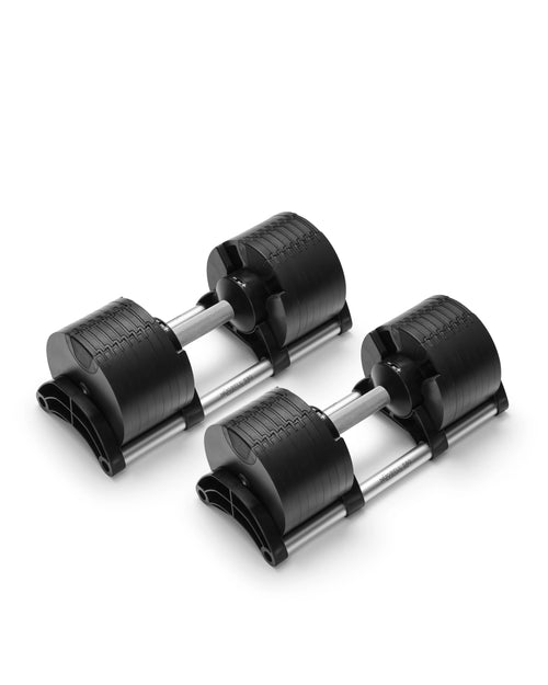 NÜOBELL 580 silver adjustable dumbbells featuring sleek design and easy weight adjustment, perfect for space-saving home workouts and versatile strength training.