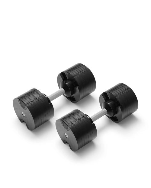 NÜOBELL 580 silver adjustable dumbbells featuring sleek design and easy weight adjustment, perfect for space-saving home workouts and versatile strength training.