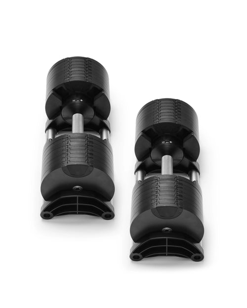 NÜOBELL 580 silver adjustable dumbbells featuring sleek design and easy weight adjustment, perfect for space-saving home workouts and versatile strength training.