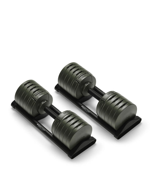 NÜOBELL S 240 Forest – stylish, compact adjustable dumbbell in forest green, designed for efficient home strength training with quick weight changes and robust Swedish craftsmanship.