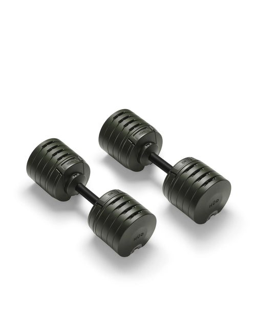 NÜOBELL S 240 Forest – stylish, compact adjustable dumbbell in forest green, designed for efficient home strength training with quick weight changes and robust Swedish craftsmanship.