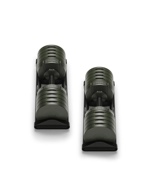NÜOBELL S 240 Forest – stylish, compact adjustable dumbbell in forest green, designed for efficient home strength training with quick weight changes and robust Swedish craftsmanship.