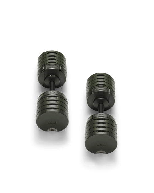 NÜOBELL S 240 Forest – stylish, compact adjustable dumbbell in forest green, designed for efficient home strength training with quick weight changes and robust Swedish craftsmanship.