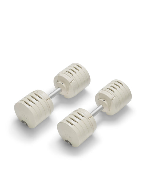 NÜOBELL S 240 Sand – sleek, space-saving adjustable dumbbell in sand color, engineered for versatile strength training at home with easy weight adjustments and durable design.
