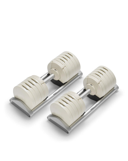 NÜOBELL S 5100 Sand – premium adjustable dumbbell set in sand color, offering compact design and easy weight adjustments for versatile home strength training sessions.