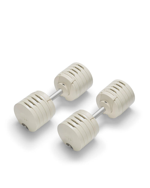 NÜOBELL S 5100 Sand – premium adjustable dumbbell set in sand color, offering compact design and easy weight adjustments for versatile home strength training sessions.