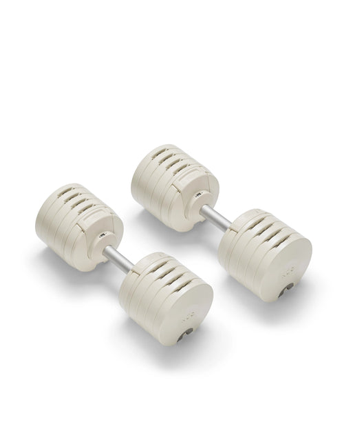 NÜOBELL S 5100 Sand – premium adjustable dumbbell set in sand color, offering compact design and easy weight adjustments for versatile home strength training sessions.