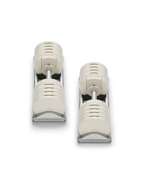 NÜOBELL S 5100 Sand – premium adjustable dumbbell set in sand color, offering compact design and easy weight adjustments for versatile home strength training sessions.
