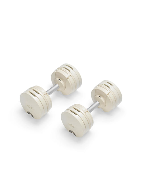 NÜOBELL S 560 Sand – durable adjustable dumbbell in sand color, featuring easy weight adjustments and compact design for versatile home strength training.